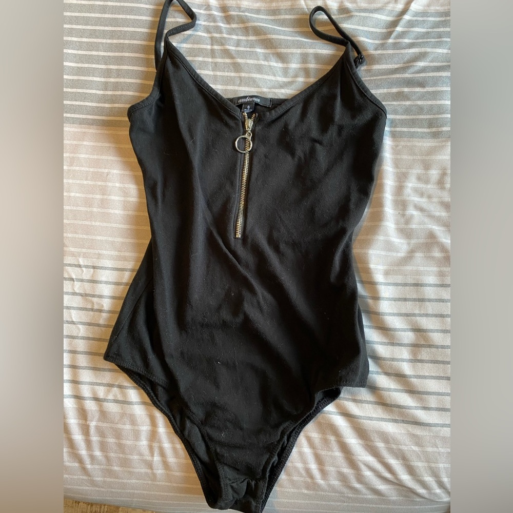 Lightly worn black body suit